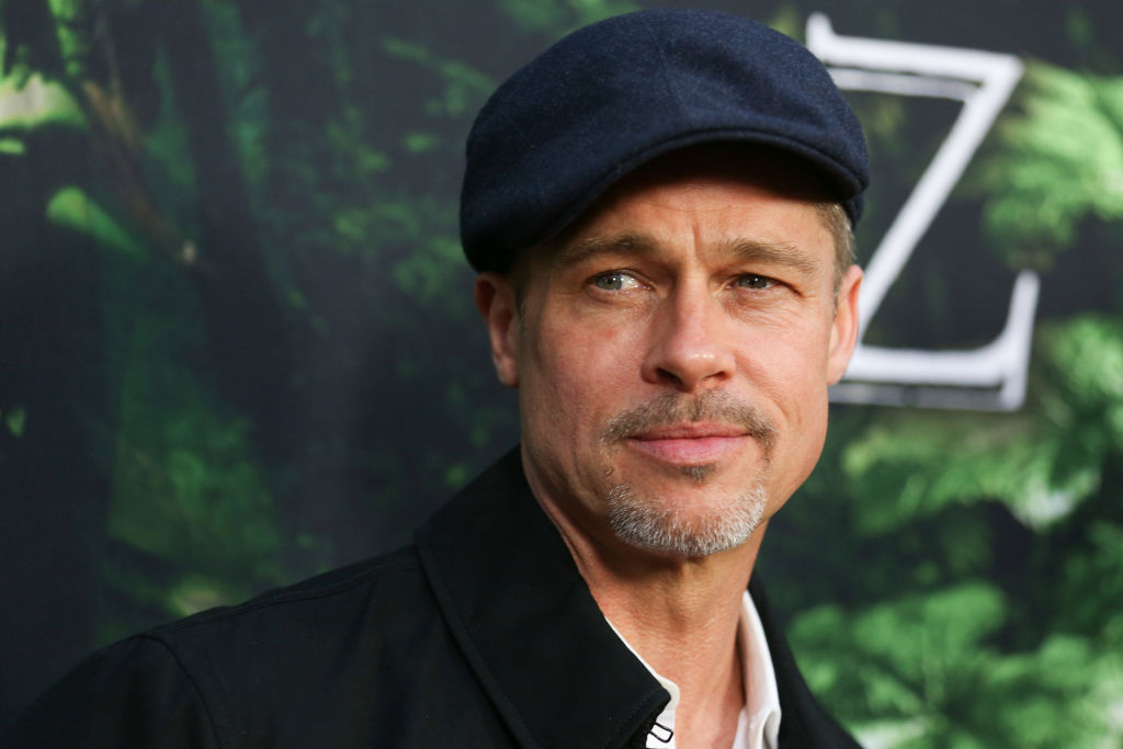 Angelina Jolie brings reinforcements - including dad Jon Voight - to movie premiere